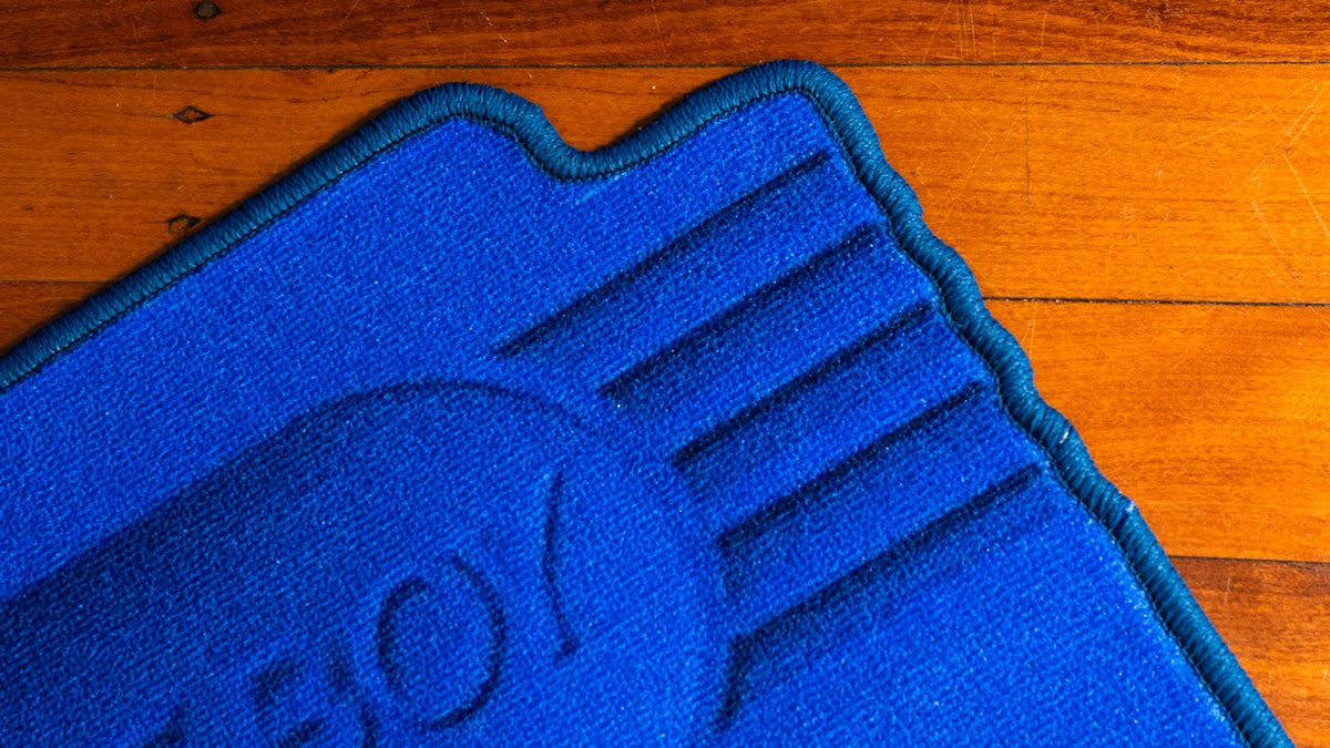 Cartridge cutout rug close-up, clipped corner detail